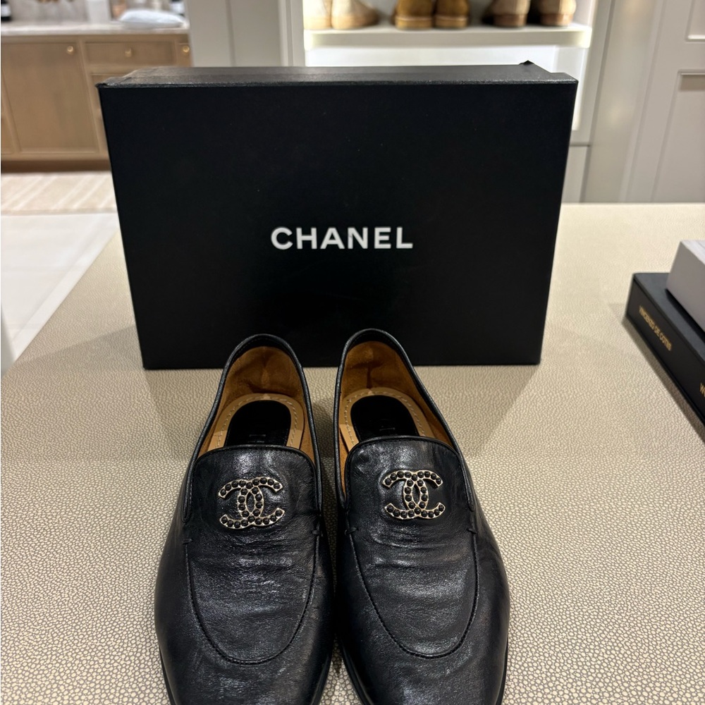 CHANEL Black Leather Loafers with Logo Detail